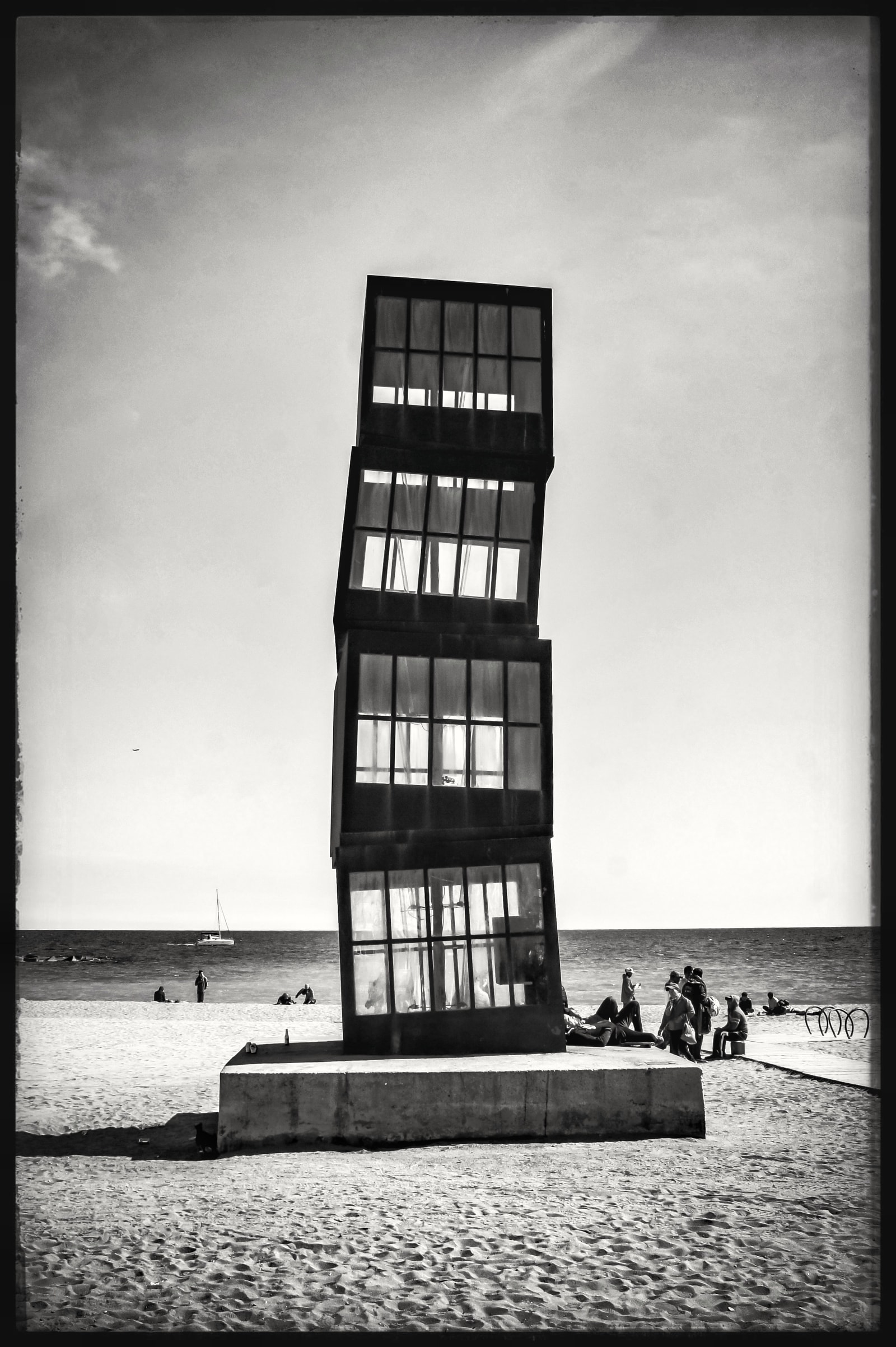 A black and white close-up photo of Rebecca Horn's sculpture 'L'Estel Ferit', showing its stacked, windowed cubes.