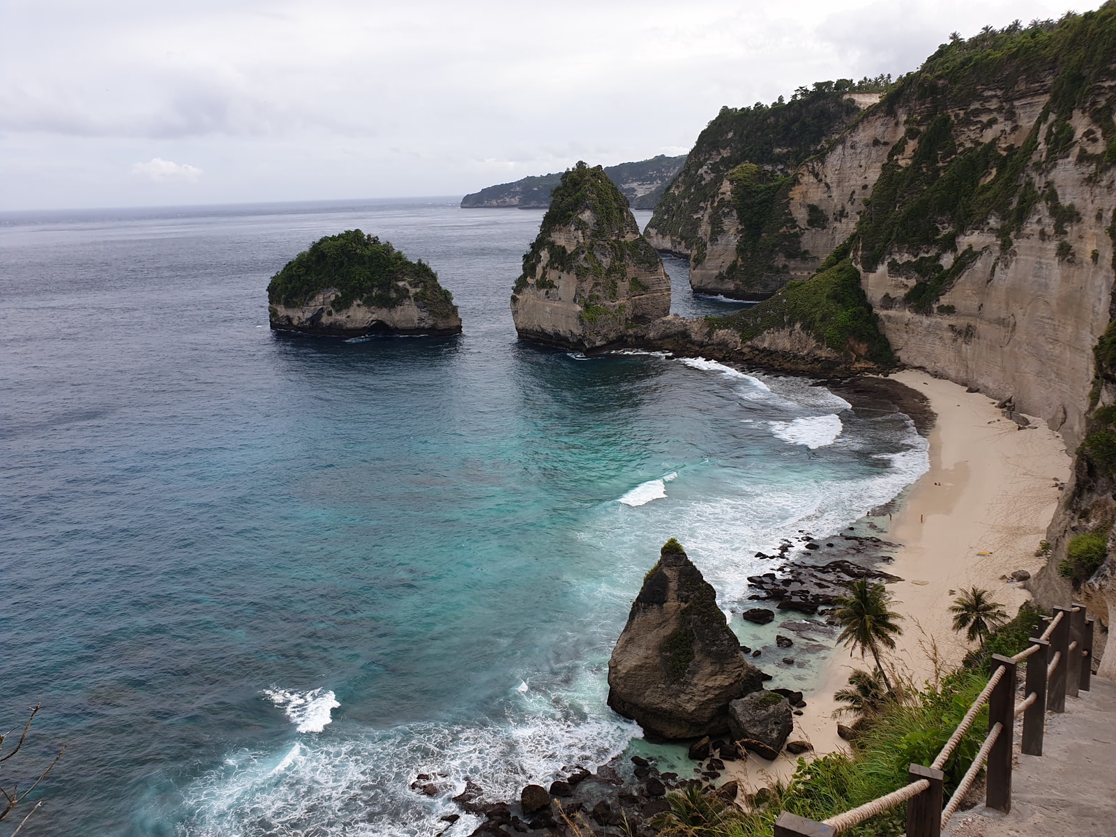The striking sea stacks and turquoise water of Diamond Beach on Nusa Penida's east coast.