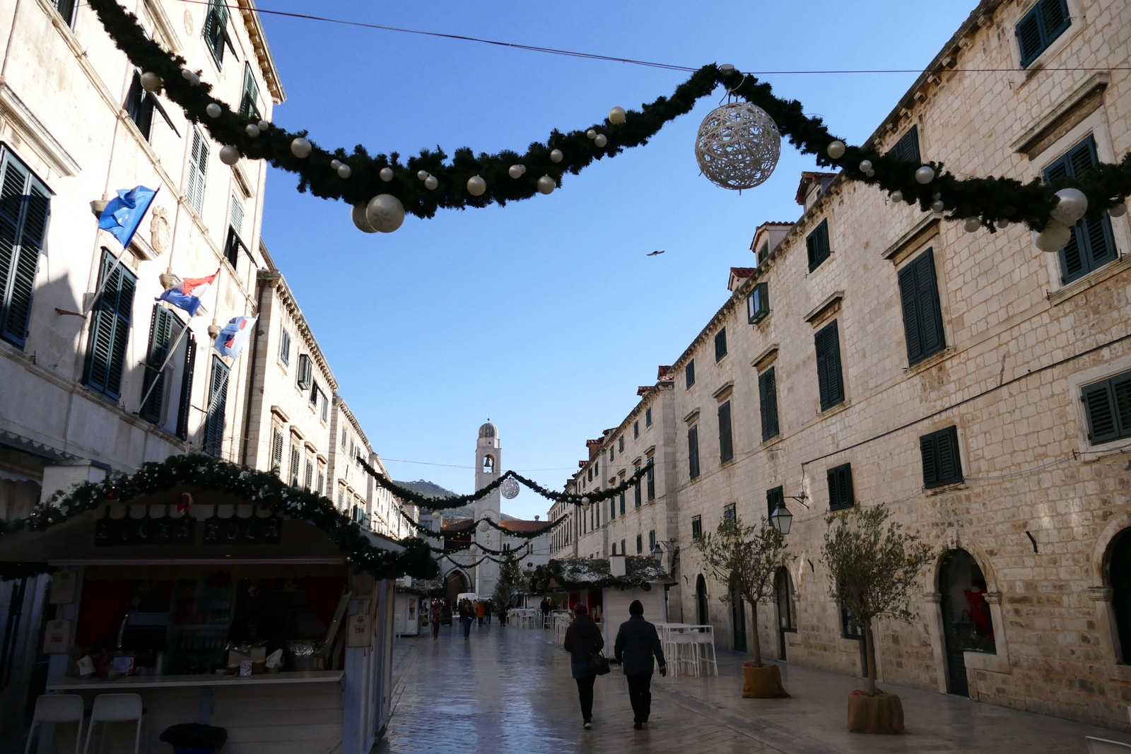 The main street of Dubrovnik's Old Town, Stradun, decorated with festive garlands for the holidays.