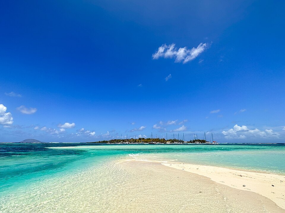 The turquoise lagoon and white sandbar of Gabriel Island, a popular destination for boat trips from northern Mauritius.