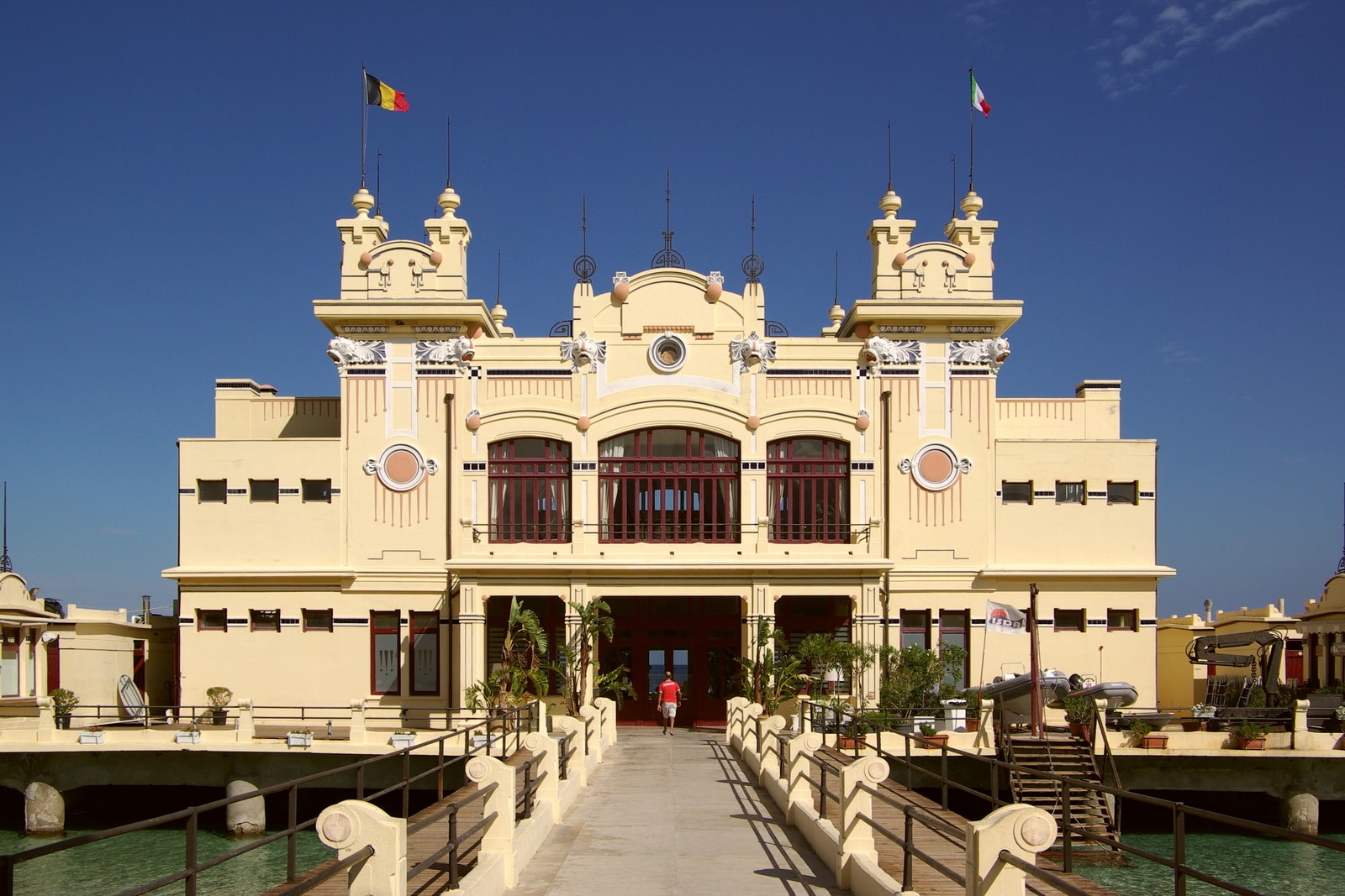 A black and white photograph capturing the symmetrical beauty of the Antico Stabilimento Balneare, highlighting its Art Nouveau architecture.