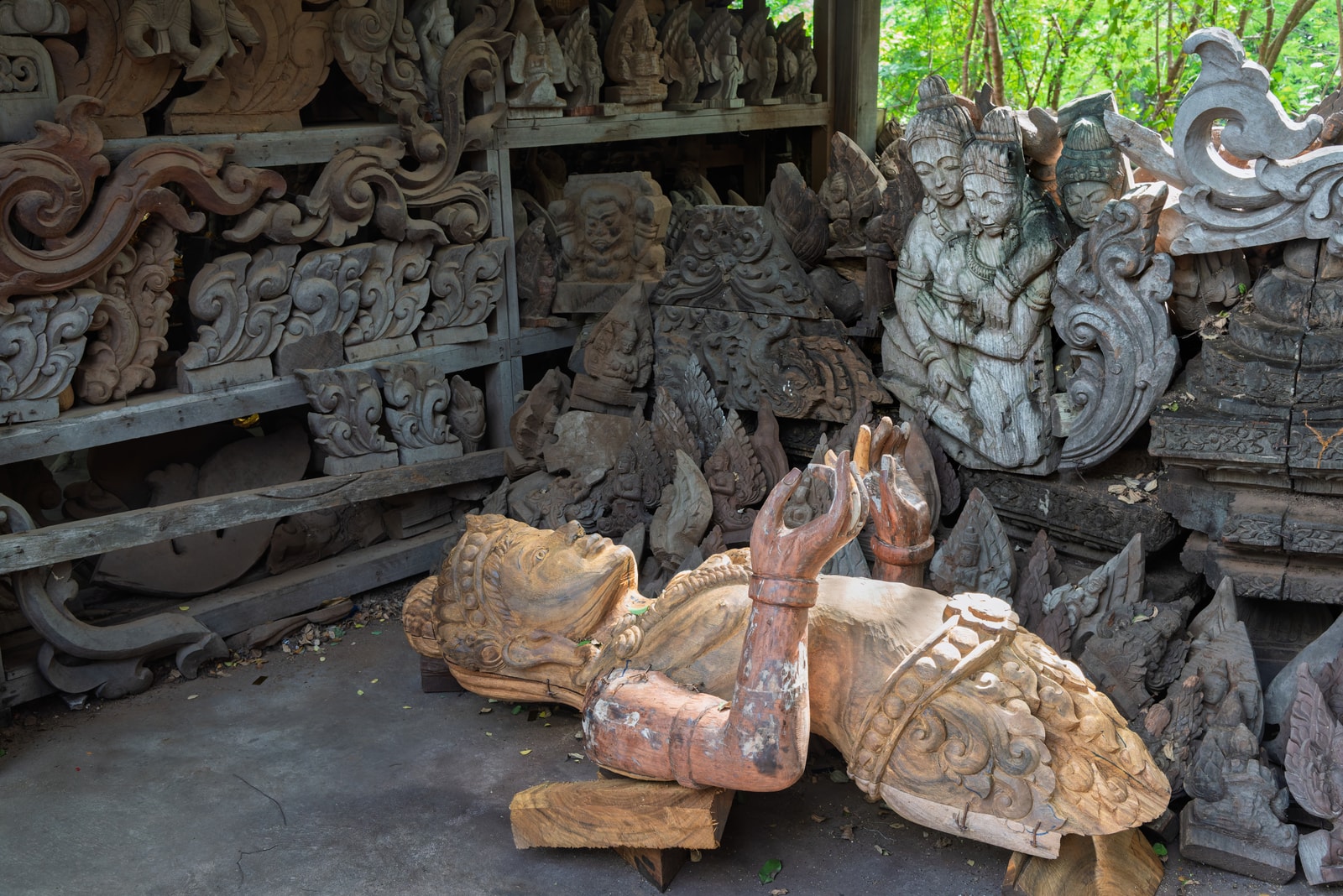 A close-up view of the incredibly detailed wooden carvings depicting figures and patterns at the Sanctuary of Truth.