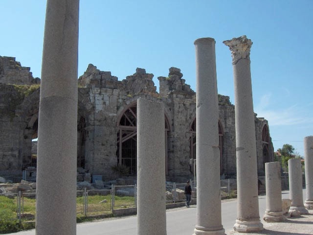 A line of ancient weathered columns stands in Side, Turkey.