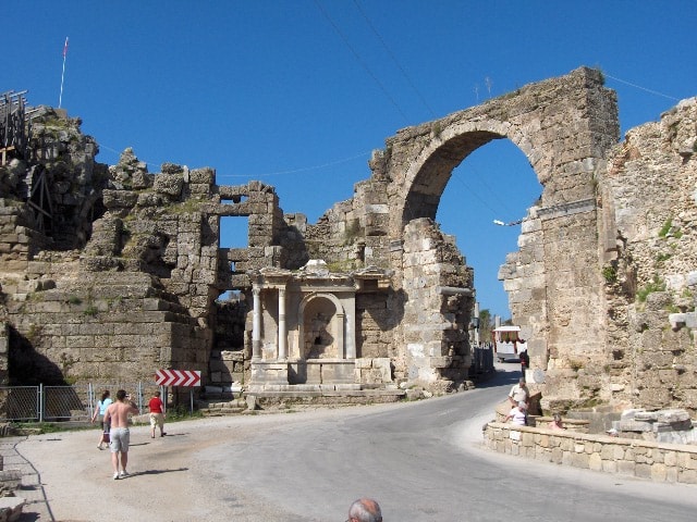 The arched ruins of the Great Gate, an ancient entrance to the city of Side.